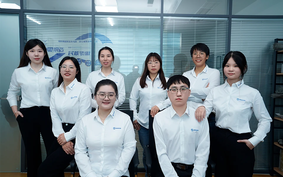 Our screening and filtering team members are wearing white shirts with the company logo.